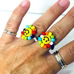 Handmade happy face flower ring.